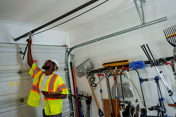 Professional Garage Door Maintenance technician working in Ferguson, MO